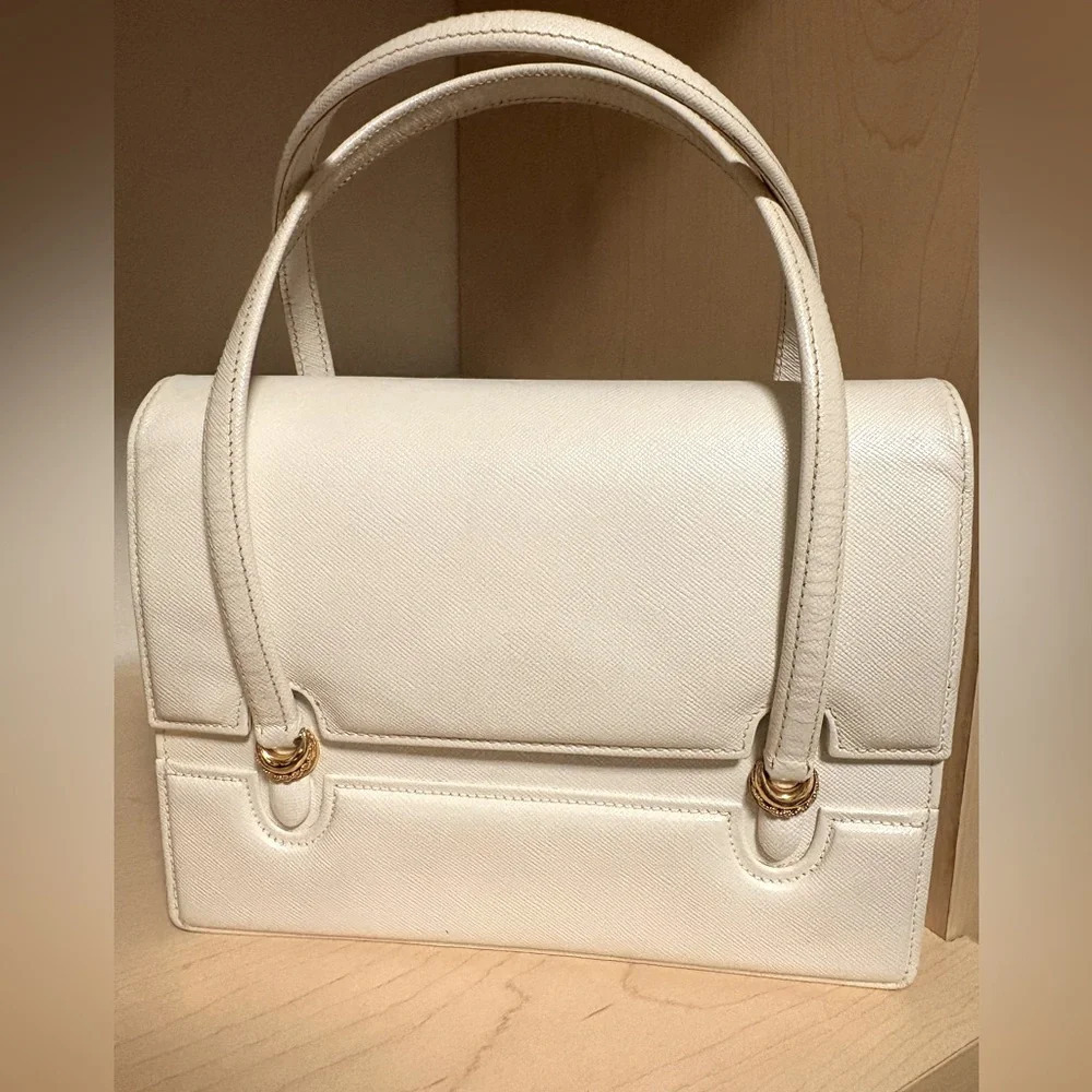 Gucci RARE EUC vintage white leather bag w/gold hardware, shield zipper. UNICORN
